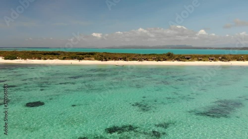 Sunny aerial view the Mer d'Emeraude, a beautiful blue lagoon near Diego Suarez in Madagascar, known for kiteboarding, and famous travel destination in the India ocean