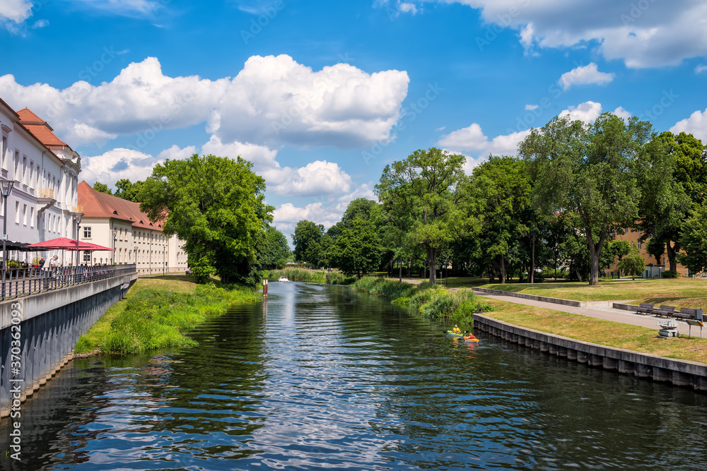 Fototapeta premium View of Oranienburg Castle with the banks of the river Havel in the foreground