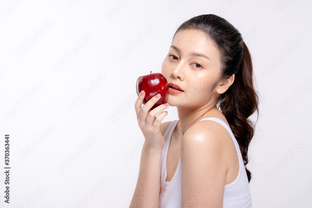 Beautiful young woman with clean fresh skin . Facial treatment . Cosmetology , beauty and spa . Skin care Beautiful young woman with clean fresh skin . Facial treatment . Cosmetology , beauty and spa . Skin care