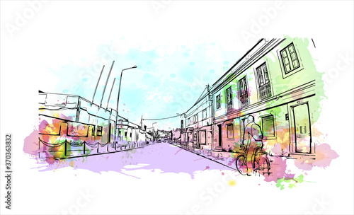 Building view with landmark of Almada is a city and a municipality in Portugal. Watercolor splash with hand drawn sketch illustration in vector.