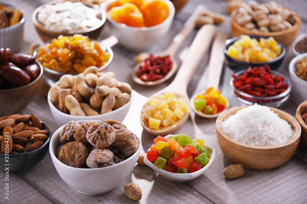 Composition with dried fruits and assorted nuts. Delicacies