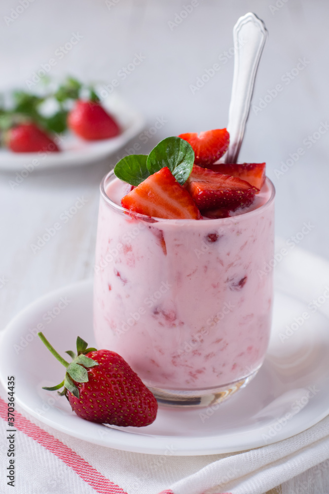 Yogurt with fresh strawberry in glass Yogurt with fresh strawberry in glass
