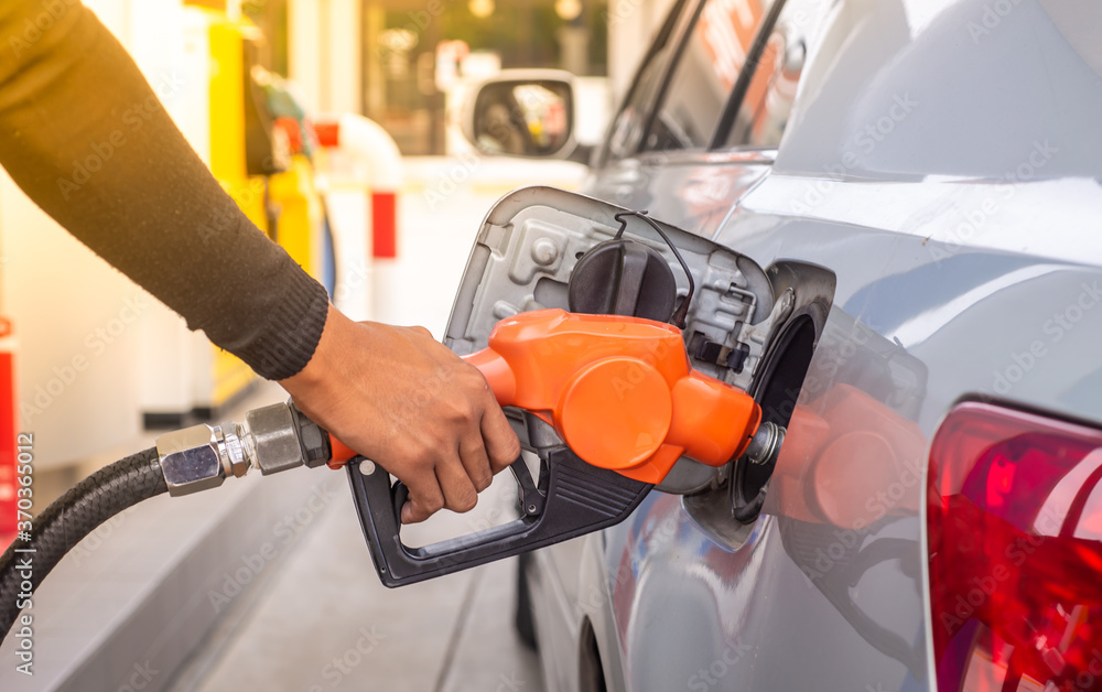 filling the gas tank filling the gas tank