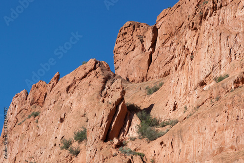 Mountain of rock against a blue sky