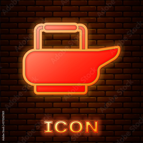 Glowing neon Bedpan icon isolated on brick wall background. Toilet for bedridden patients. Vector Illustration.