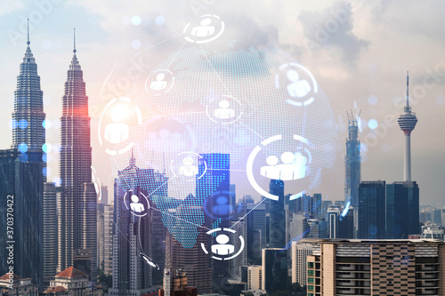 Canvas Print Social media icons hologram over panorama city view of Kuala Lumpur, Malaysia, Asia