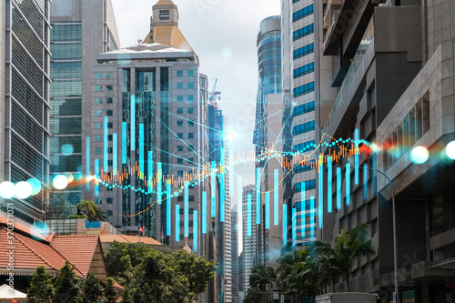 Forex and stock market chart hologram over panorama city view of Singapore, the financial center in Asia. The concept of international trading. Double exposure. photo