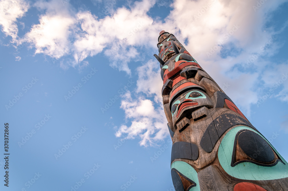 Totem pole in Jasper National Park at dusk Stock Photo Adobe Stock