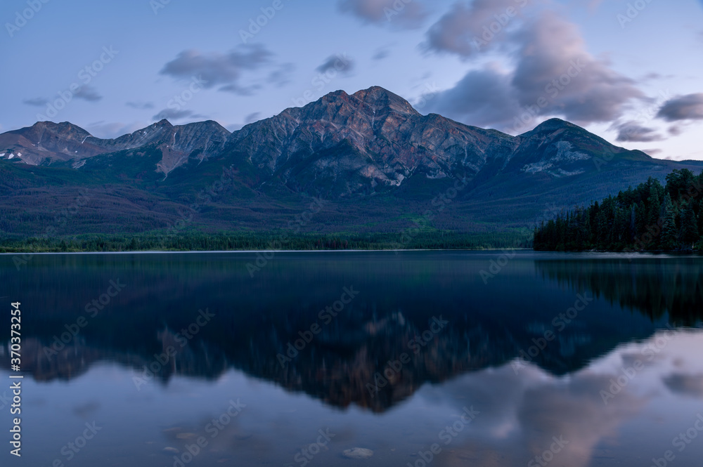 View of Pyramid Lake in Jasper National Park at sunrise. 