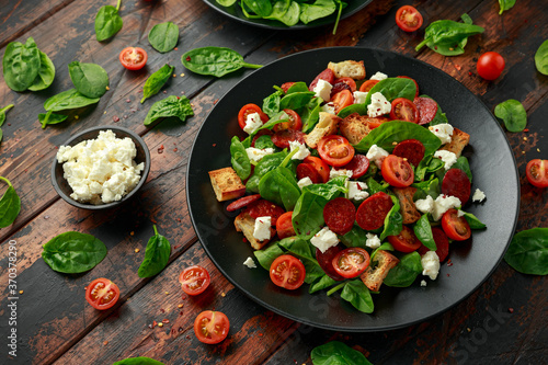 Chorizo Tomato salad with spinach, feta cheese and croutons. healthy summer food