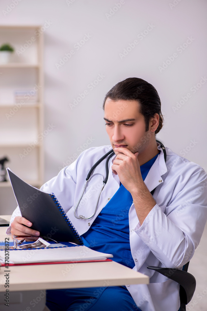 Young doctor working in the hospital Young doctor working in the hospital