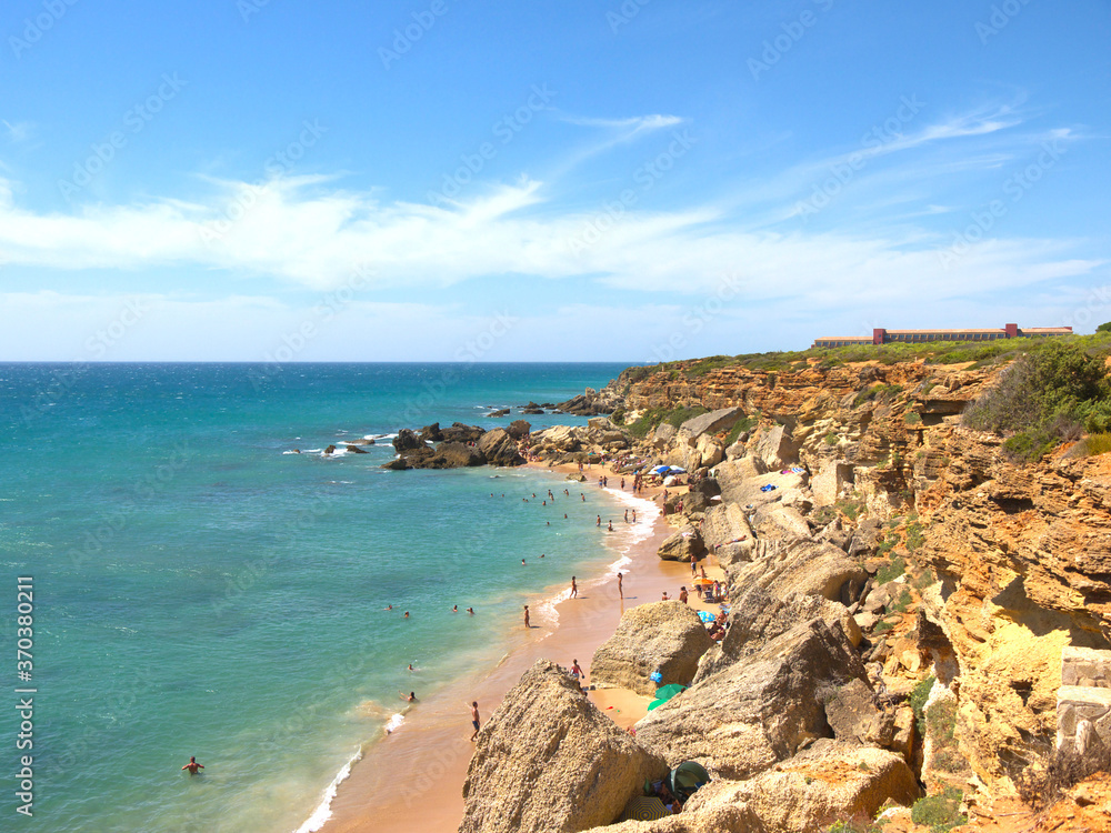 Landscape of coves in Conil de la Frontera, from top, with turquoise blue water, Cadiz, Andalucia, Spain