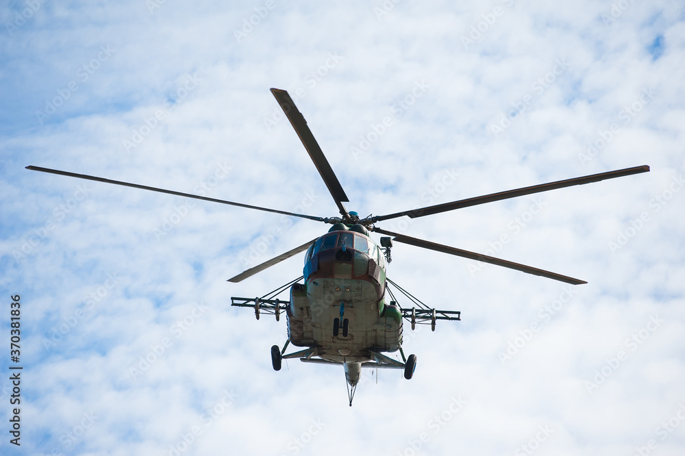 Fototapeta premium Military helicopter flying during exercise