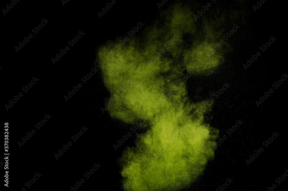 Light green powder explosion on black background. Colored powder cloud. Colorful dust explode. Paint Holi. Light green powder explosion on black background. Colored powder cloud. Colorful dust explode. Paint Holi.