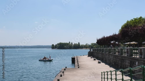 Tourists boat on Lake Maggiore, Italy. Arona and Angera
