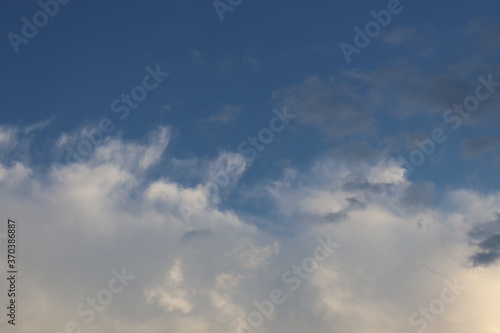 Fototapeta Naklejka Na Ścianę i Meble -  blue sky with white and black clouds