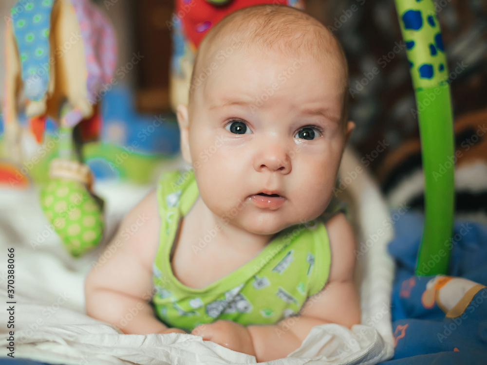 portrait of lying funny Caucasian baby boy portrait of lying funny Caucasian baby boy