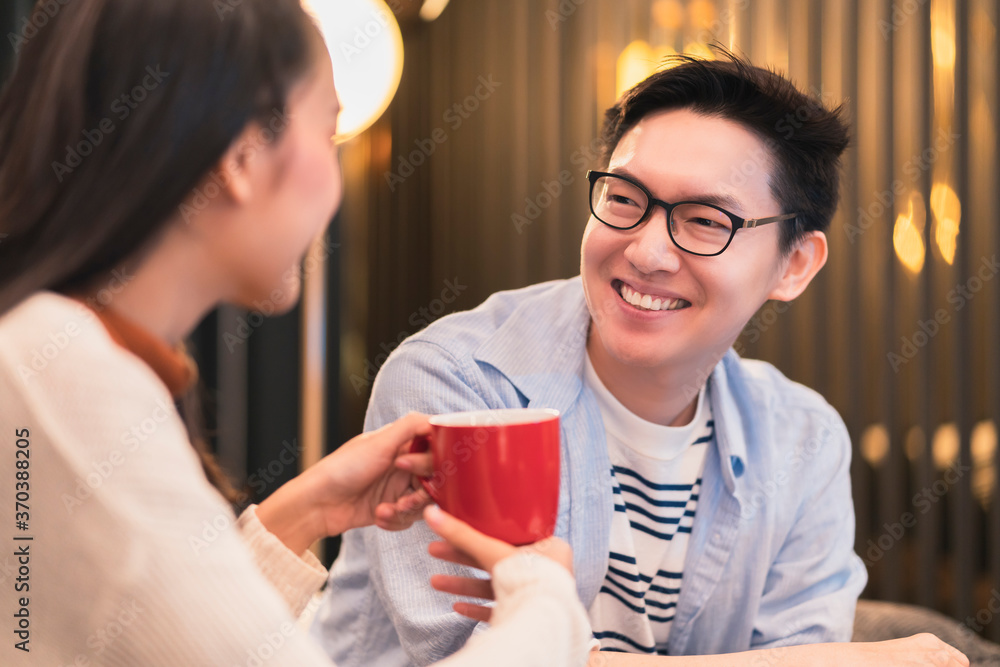 asian marrige couple enjoy weekend vacation with good conversation and coffee home interior background asian marrige couple enjoy weekend vacation with good conversation and coffee home interior background
