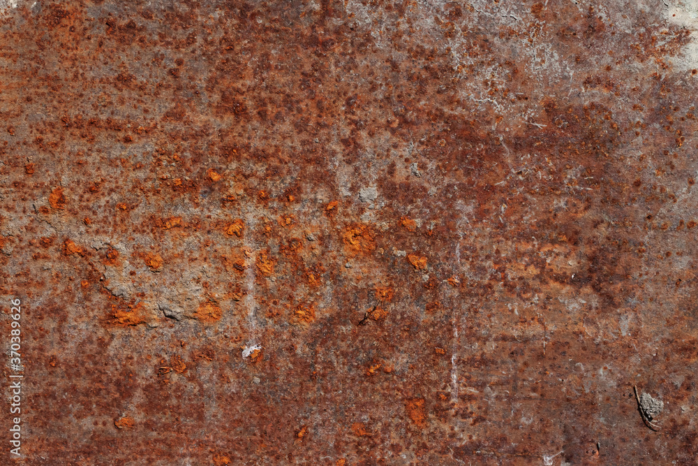 Orange rusty metal aged shabby industrial grunge texture pattern for macro wallpaper or background Orange rusty metal aged shabby industrial grunge texture pattern for macro wallpaper or background