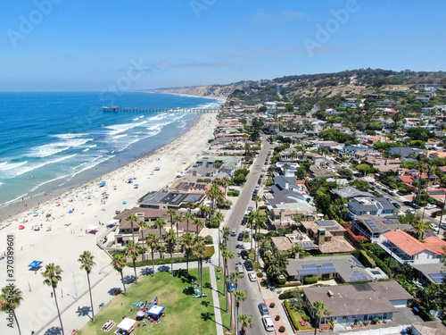 Aerial view of La Jolla bay with nice small waves and tourist enjoying the beach and summer day. La Jolla  San Diego  California  USA. Beach with pacific ocean