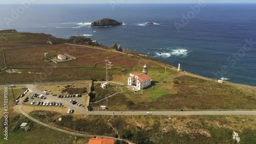 Lighthouse in Cabo de Peñas. Asturias,Spain. Aerial Drone Footage photo