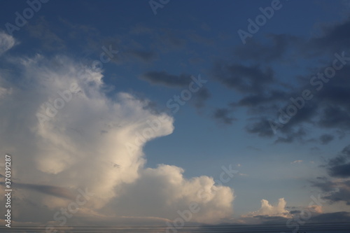 time lapse white and black clouds over blue sky