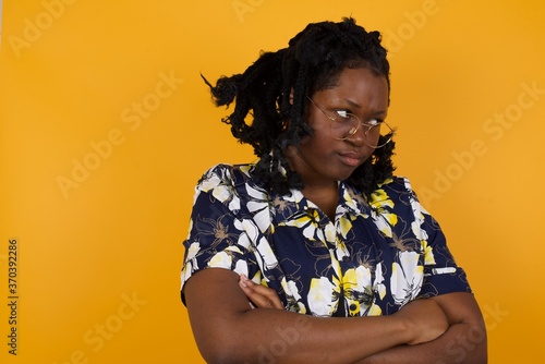 Quadro su tela Closeup portrait displeased pissed off angry grumpy pessimistic woman with bad attitude, arms crossed looking sideways