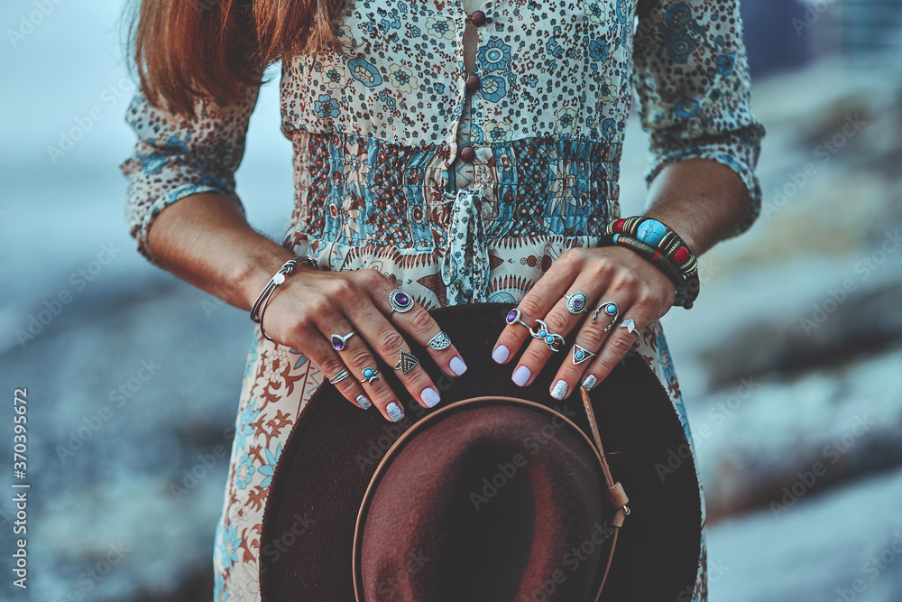 Bohemian chic gypsy woman with manicure wearing jewelry accessories and  dress. Boho detail close up Stock Photo | Adobe Stock