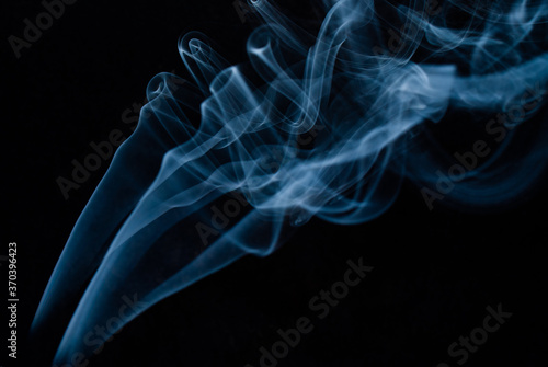 Bluish smoke on black background