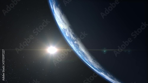 Sunrise over the Earth. View from space. The earth rotates. The camera flies towards the Earth. Realistic atmosphere. Volumetric clouds. Starry sky. 4K. 3d rendering. Stars twinkle.