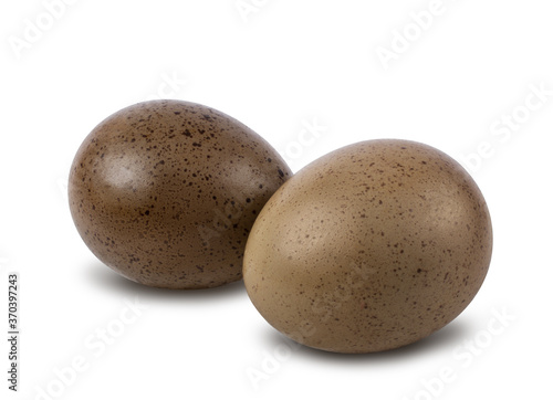 Two quail eggs isolated on a white background with clipping path.