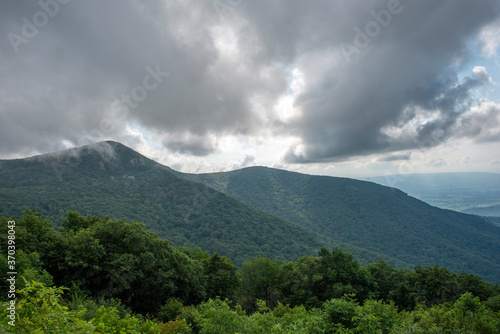 clouds over the mountain photo