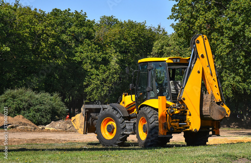 Photography Construction machinery tractor with bucket and excavator