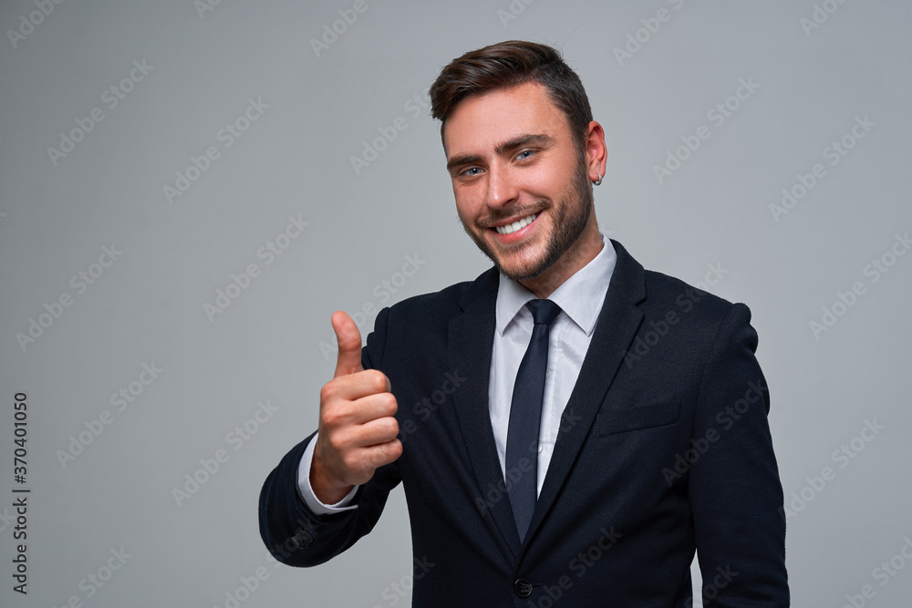 Close up portrait young man businessman. Caucasian guy business suit studio gray background. Close up portrait young man businessman. Caucasian guy business suit studio gray background.