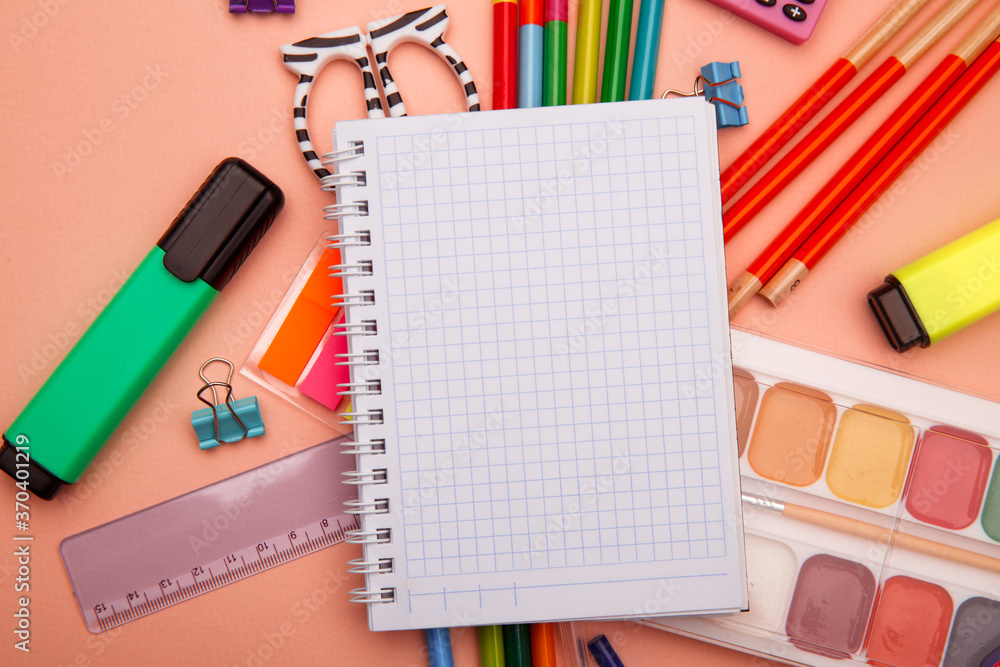 School office supplies on pink background. School office supplies on pink background.