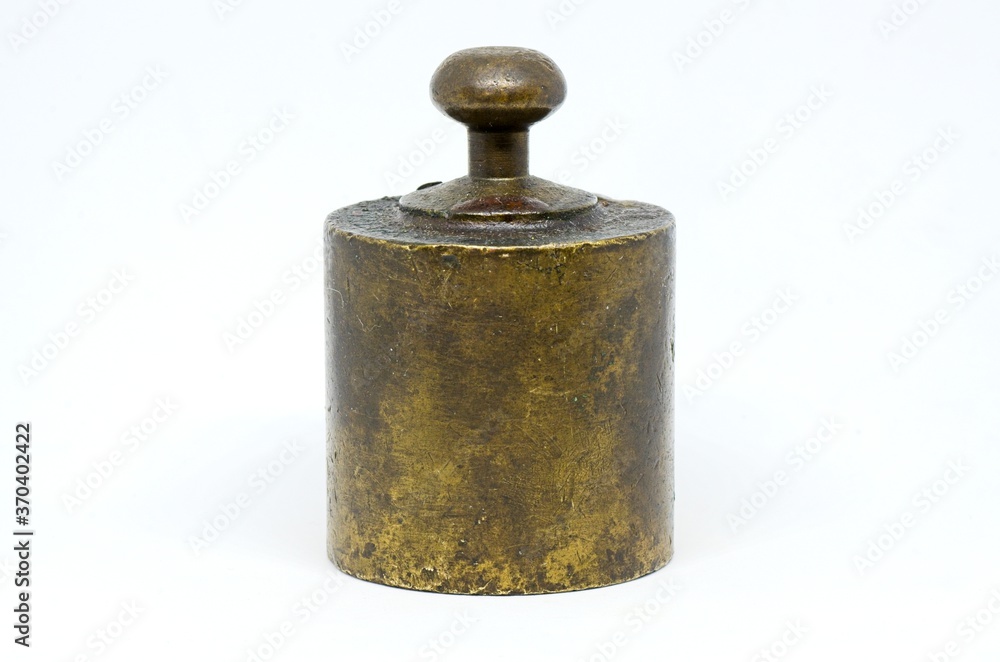 Iron weight on white background. Weighting tool Iron weight on white background. Weighting tool