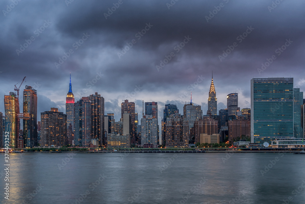 Moody Manhattan Skyline Overcast By Storm Clouds, New York City