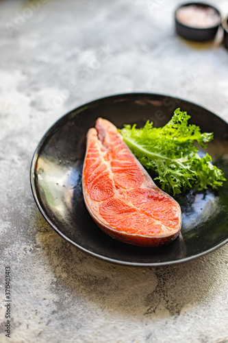 salmon raw fillet steak natural product ingredient organic eating healthy. top view place for text copy space keto or paleo diet raw second course pescetarian