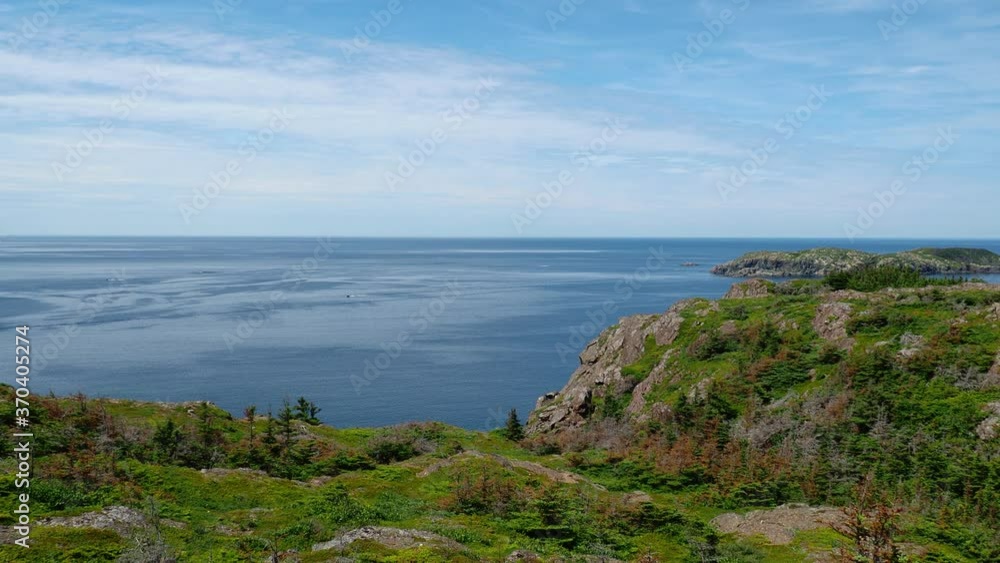 Scenic view of the Newfoundland and Labrador coastline in summer. Scenic view of the Newfoundland and Labrador coastline in summer.