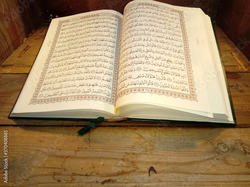 open the holy book of quran