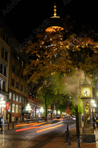 Steam clock in Gastown Vancouver at night with the Harbour Centre Lookout tower © Reimar