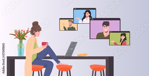 woman chatting with mix race colleagues in web browser windows during video call online conference meeting remote work self isolation concept horizontal vector illustration