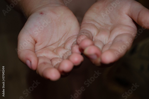 The hands of a small child.