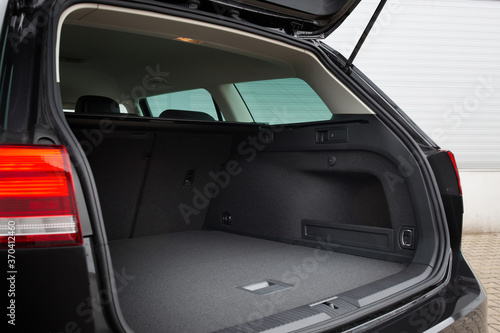 Fototapeta Wagon car open trunk. Car boot is open