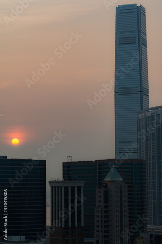 hong kong skyline with sunset