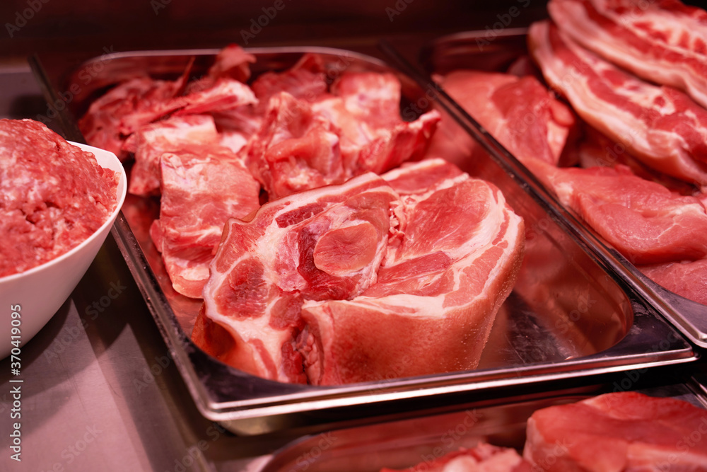 Quality raw meat showcase. Fresh and pink meat collection. Meat shop. Various and good product in the store. Quality raw meat showcase. Fresh and pink meat collection. Meat shop. Various and good product in the store.