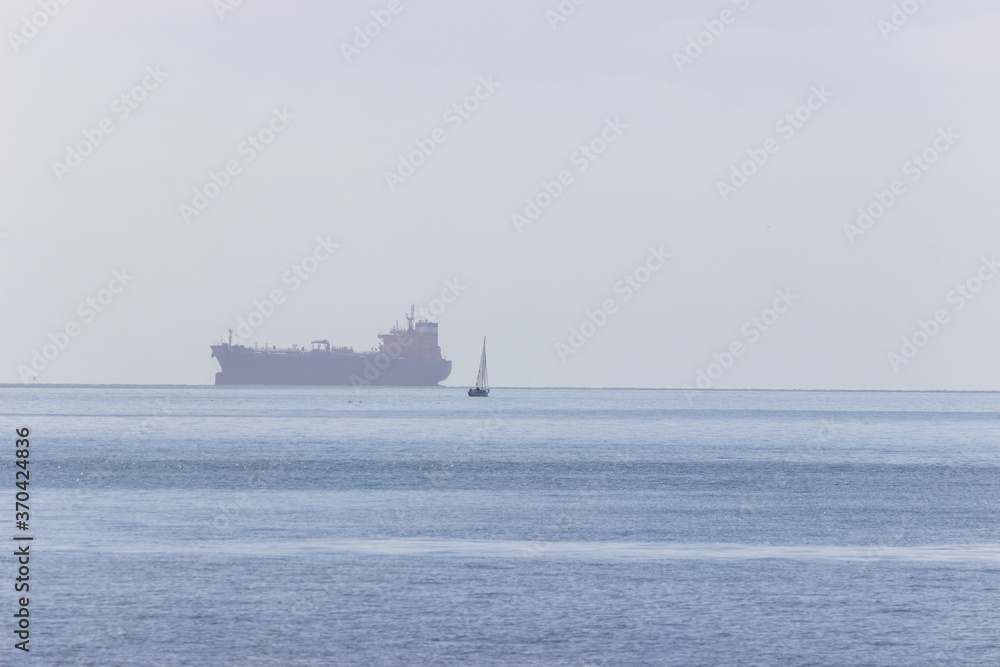 Tanker and sailboat on San Francisco Bay