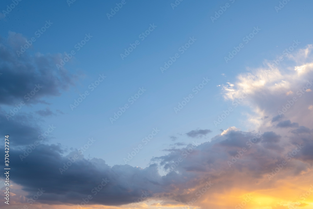 beautiful sunset, blue, yellow sky. the clouds