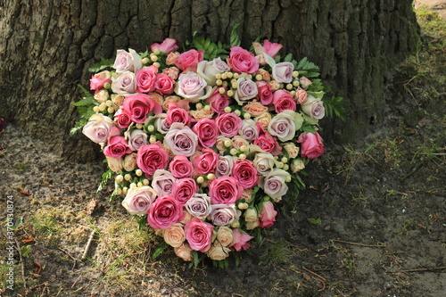 heart shaped sympathy flower arrangement