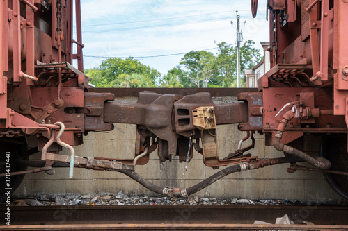 Rustic train car knuckles connected.  